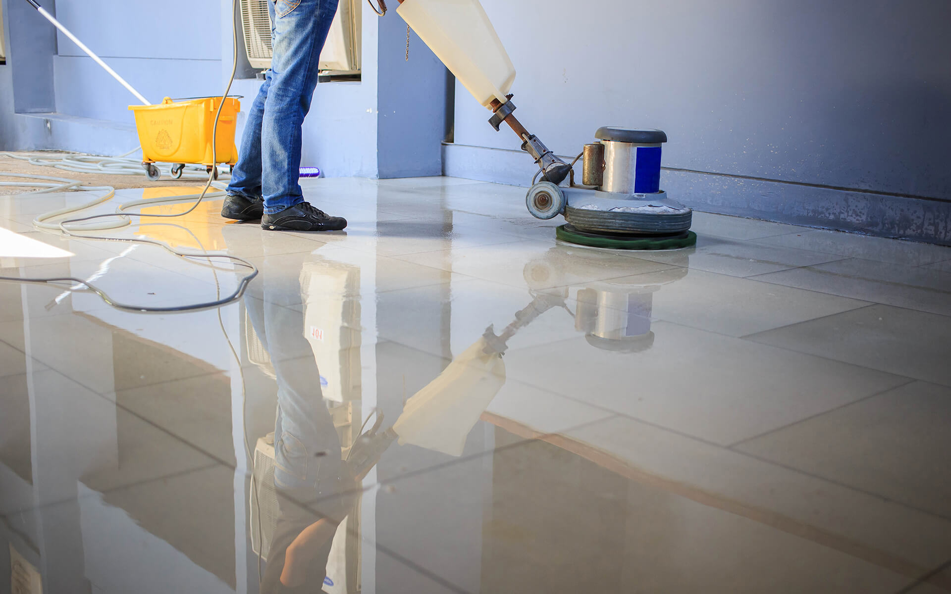 polishing floor with scrubbing machine.