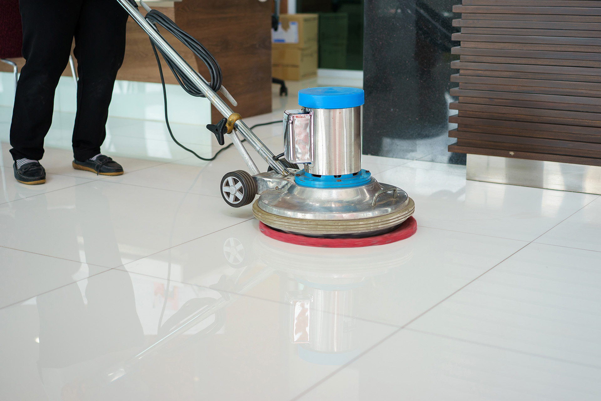 polishing floor with scrubbing machine.